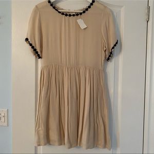 Alythea Babydoll Dress with Floral Details